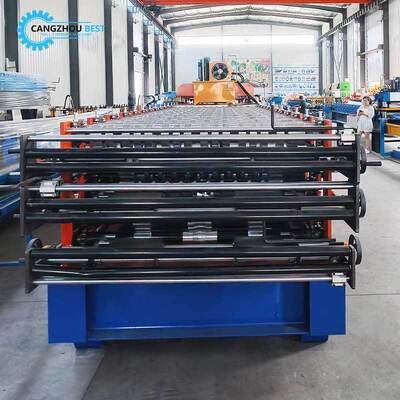 Space-saving three-layer color steel tile roll forming machine